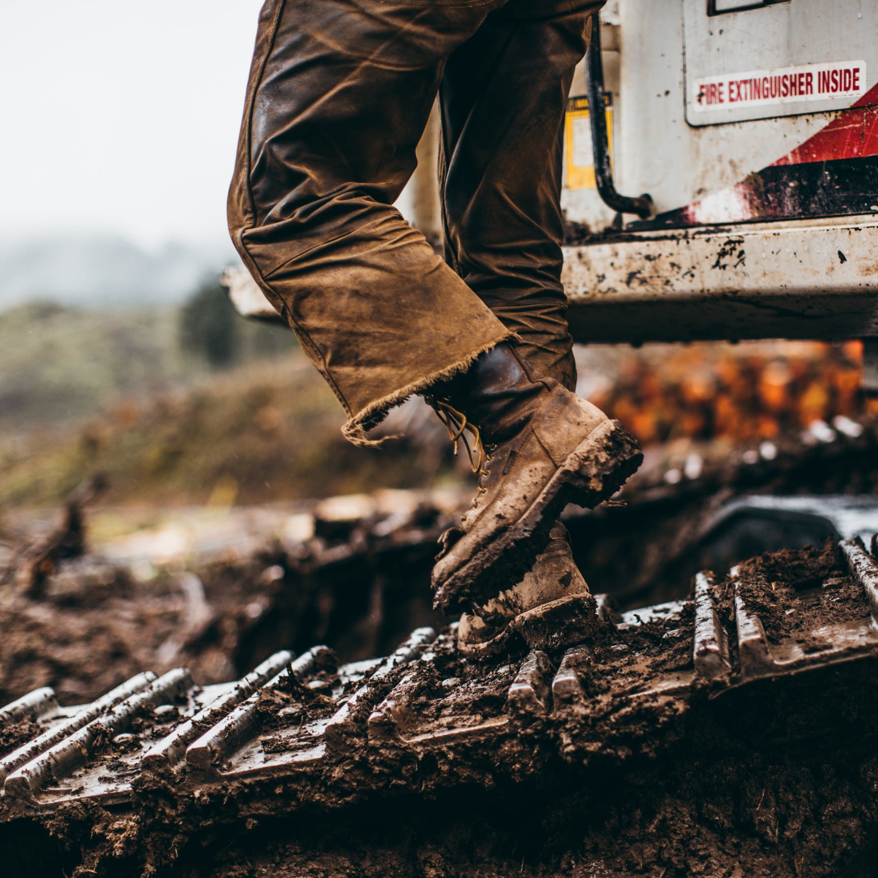 Person walking at lumber cutting job site