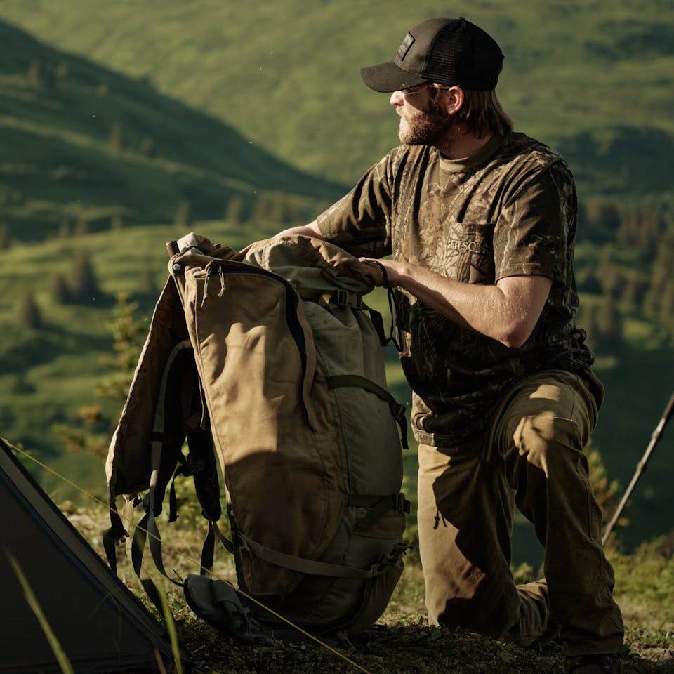 Man in Realtree camo x Filson collab