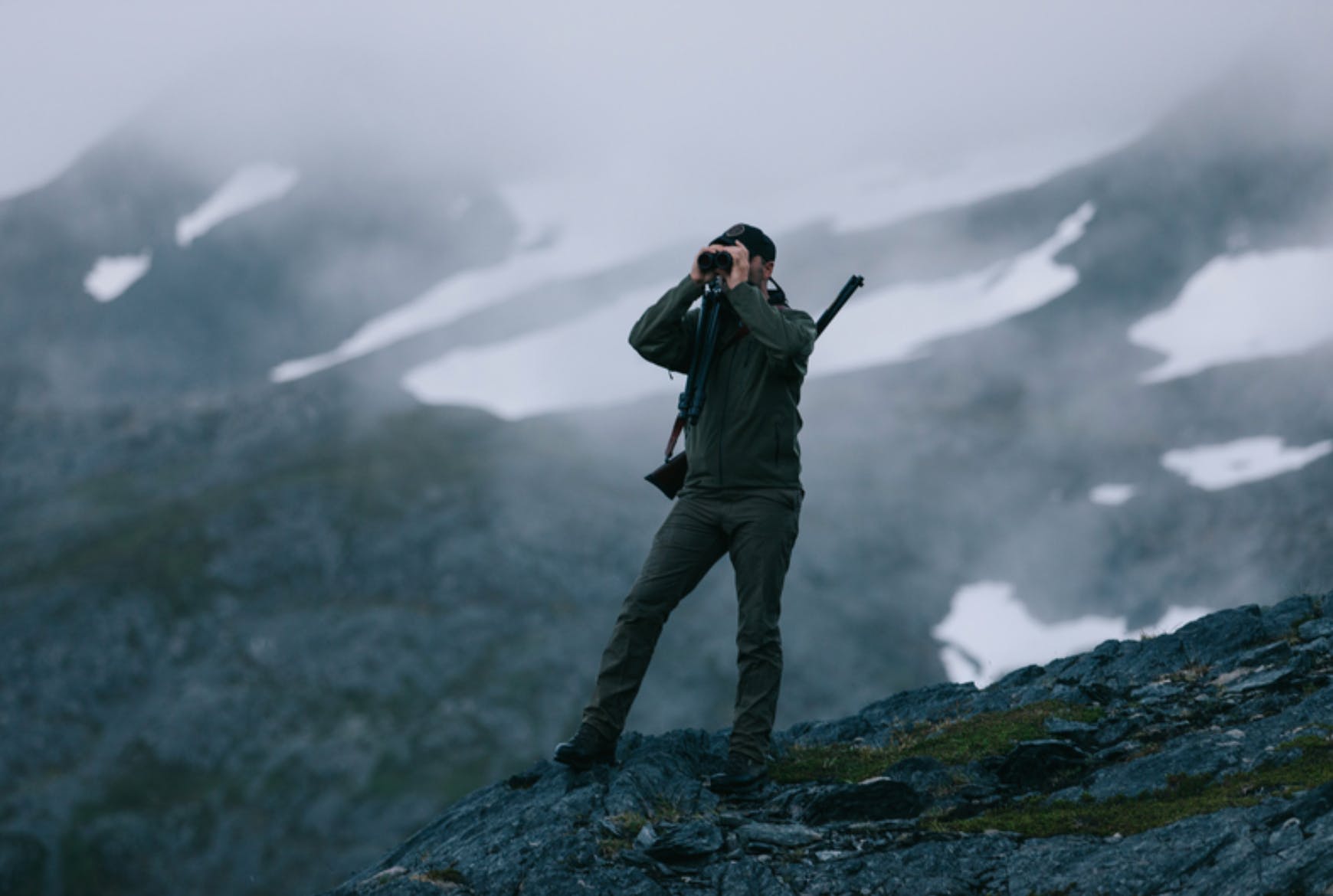 Man using binoculars