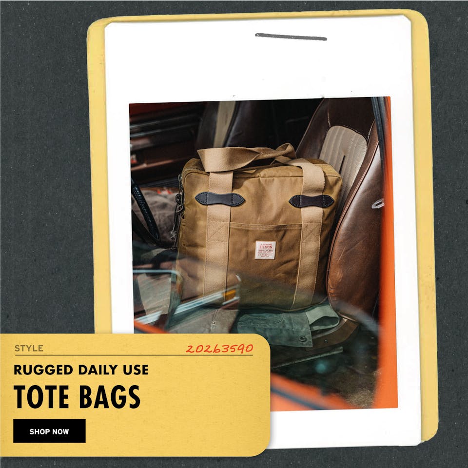 An image of filson's tin cloth tote bag with the words 'rugged daily use: tote bags' as well as a 'shop now' button superimposed onto the image